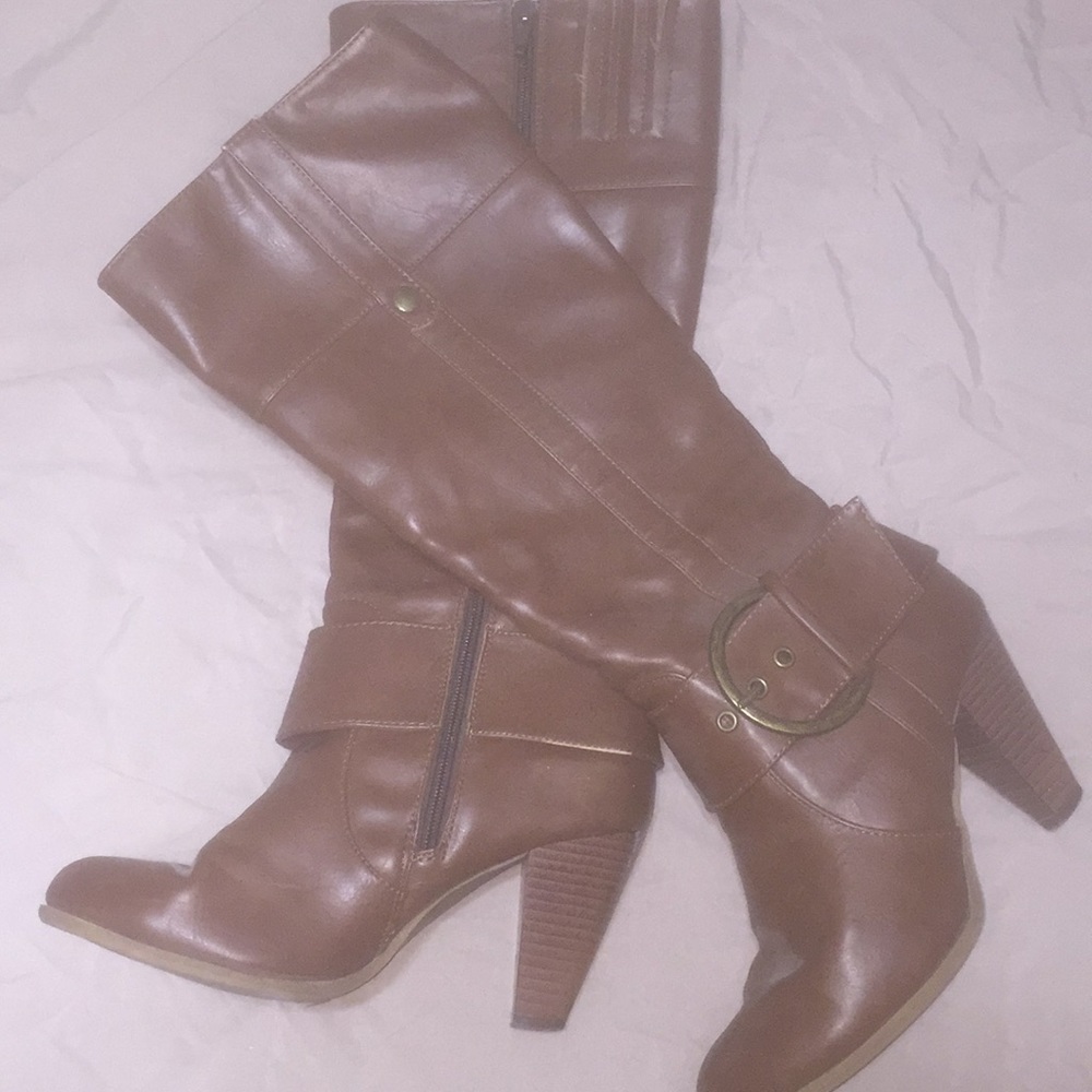 Brown below the knee boots.